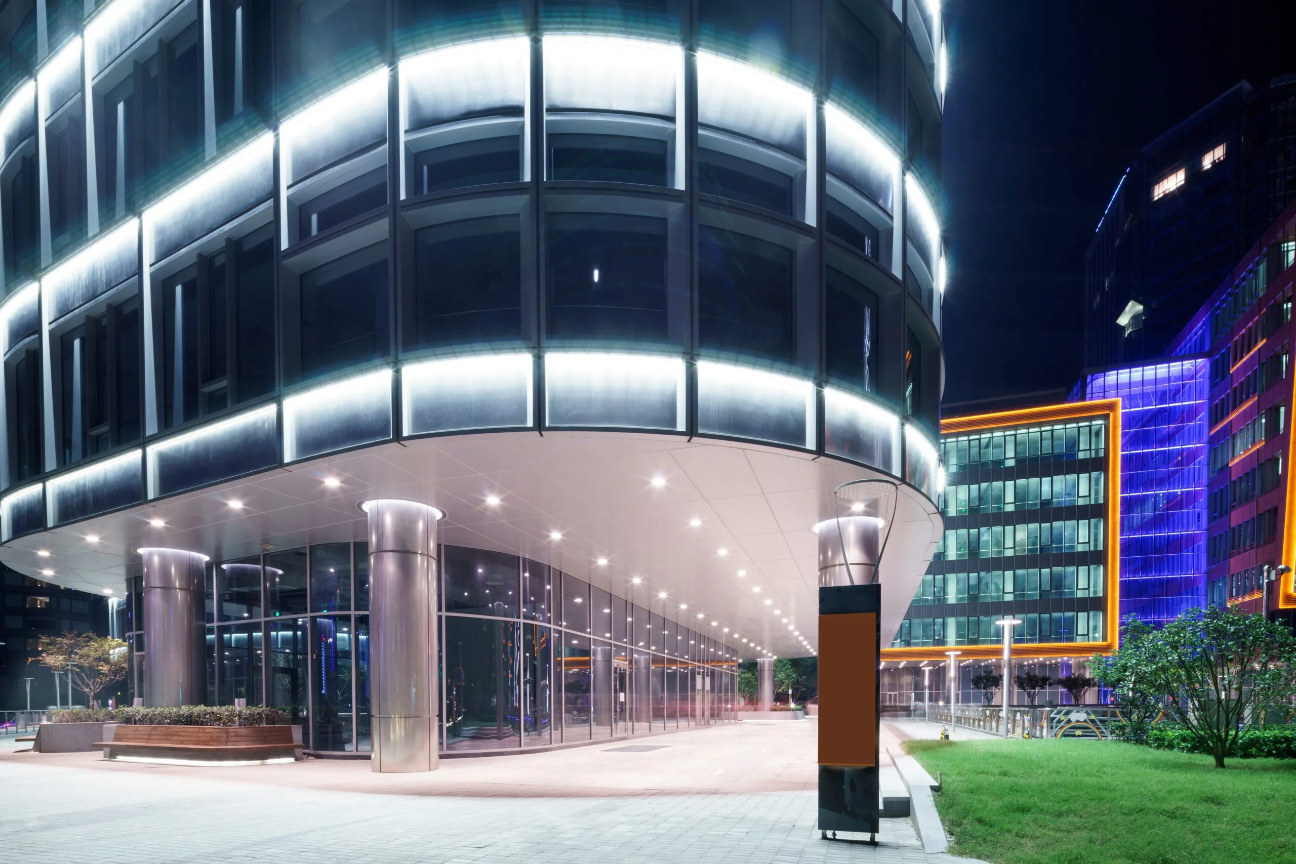 Exterior,Of,A,Modern,Shopping,Mall,At,Night Downtown building lights